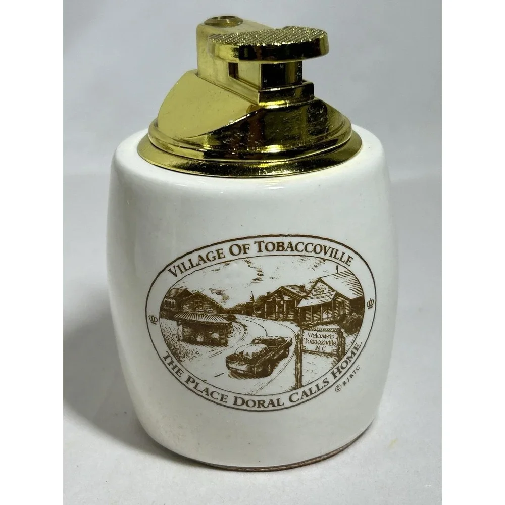 Lot of 2 Vintage Village of Tobaccoville NC North Carolina Doral Lighter NOS